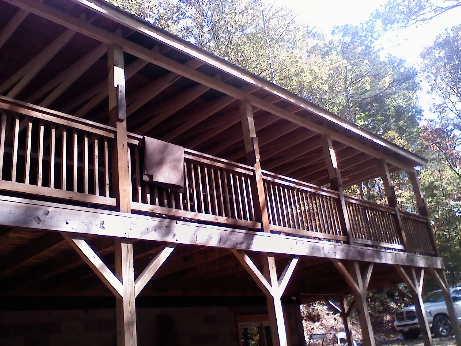 Timber framing under a new elevated porch and deck — Roof Leak Repair in Guymon by Roofing Brothers